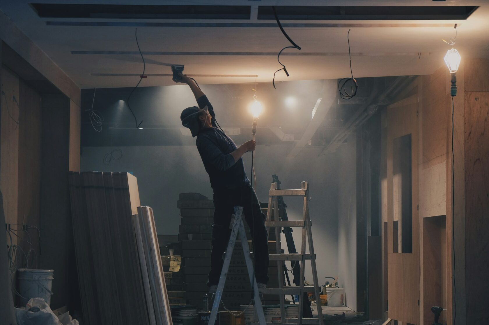Drywall installation and finishing during a home renovation