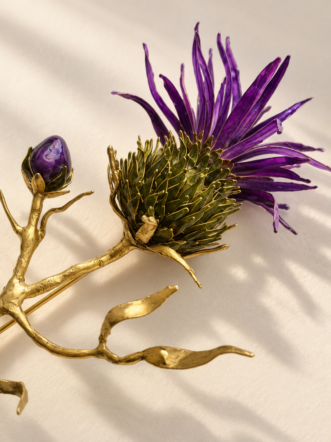 Macro detail of a purple thistle brooch