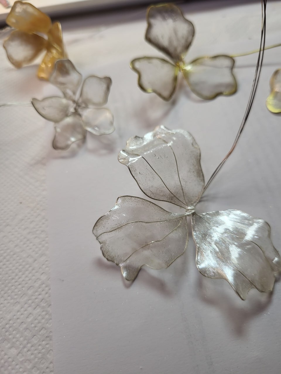 Transparent petals being shaped in the Yoli atelier