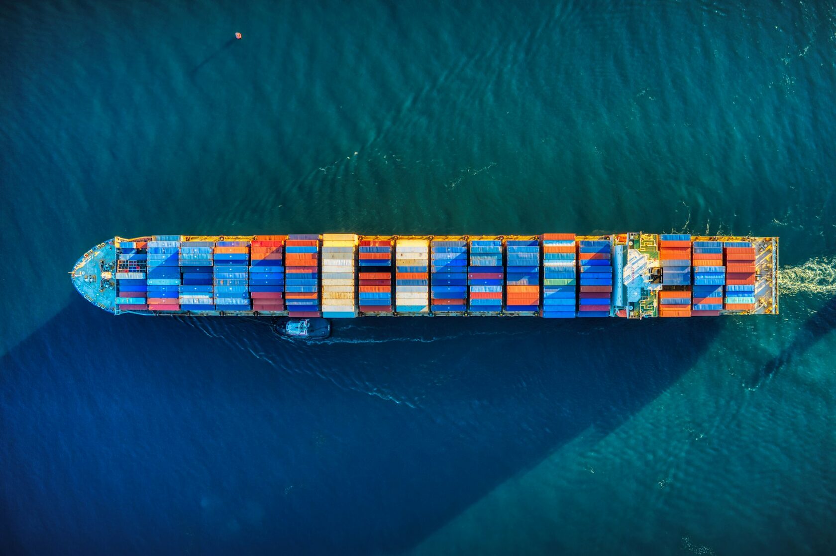 Container ship at sea viewed from above