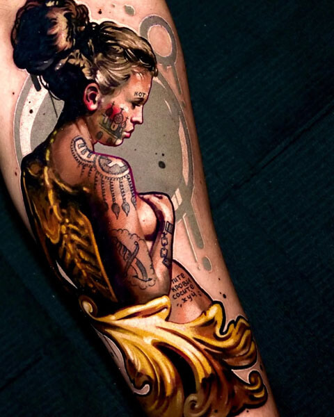 Tattoo artist in Los Angeles , side-profile female portrait tattoo on the thigh with blonde hair in a bun, facial lettering, decorative shoulder details and flowing gold ornamental drapery, by Andrey Kolbasin, 989